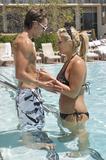 Brooke Hogan in a bikini by the pool in Los Angeles