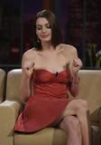 Anne Hathaway shows cleavage and legs in short dress at The Tonight Show with Jay Leno