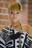 th_49853_celebrity-paradise.com-The_Elder-Rihanna_2010-02-14_-_attends_a_photo_call__5109_122_72lo.jpg