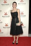 http://img230.imagevenue.com/loc483/th_66970_Emmy_Rossum_-_15th_annual_Lint_Roller_party_CU_ISA_03_122_483lo.jpg